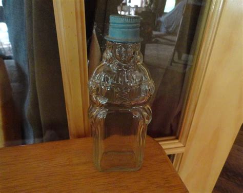 Vintage 1930s To 1940s Beau Peep Products Clear Glass Bottle Blue Metal