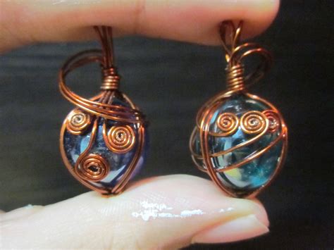 Wire Wrapped Marble | Beads and wire, Wire work jewelry, Wire wrapped jewelry