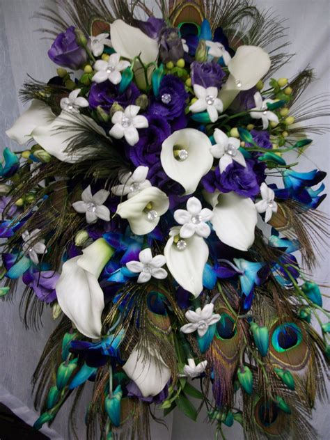 The vast majority of weddings use flowers for bouquets, centerpieces, accents, and other decorations. Feather Bouquet by NJ Wedding Pros | Feather bouquet ...