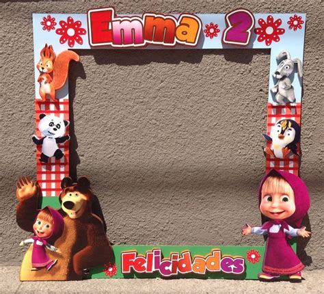 There Is A Photo Frame Made To Look Like The Characters From Masha And The Bear
