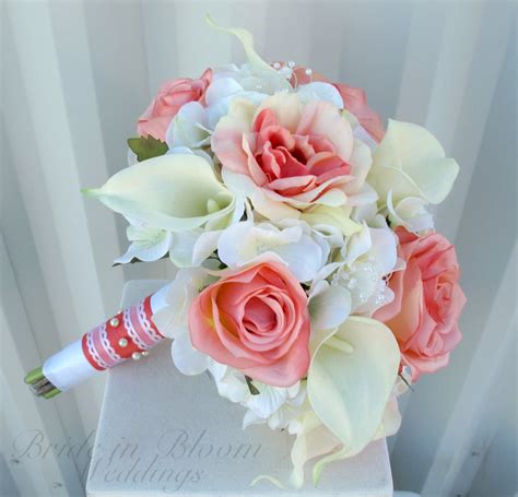 Maybe you would like to learn more about one of these? Wedding bouquet Coral rose white real touch calla lily
