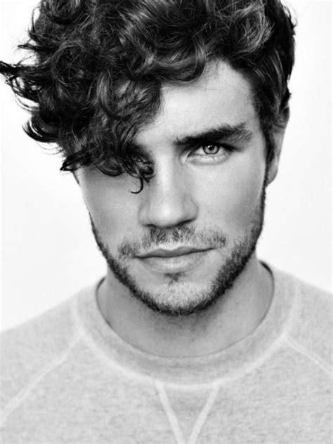 High skin fade + medium curly hair on top 23. 50 Long Curly Hairstyles For Men - Manly Tangled Up Cuts