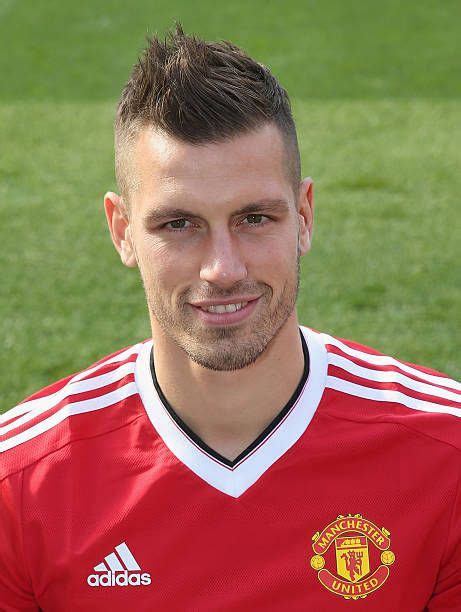 morgan schneiderlin of manchester united poses during the club s annual photocall at old
