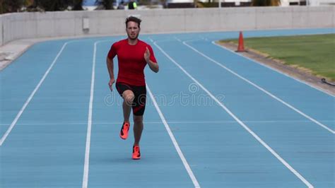 Sprinter Man Running Sprint Training On Athletics Track And Field