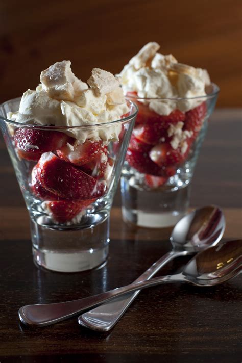 Two strawberries and cream desserts - Free Stock Image
