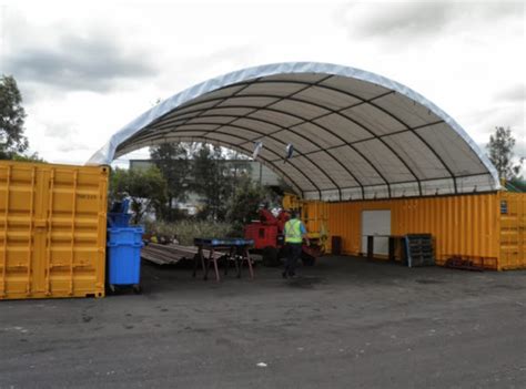 The canopy comes with a center pole that can add stability or be used in conjunction with a table. Container Canopy Shelter | 20ft - Easy Buildings