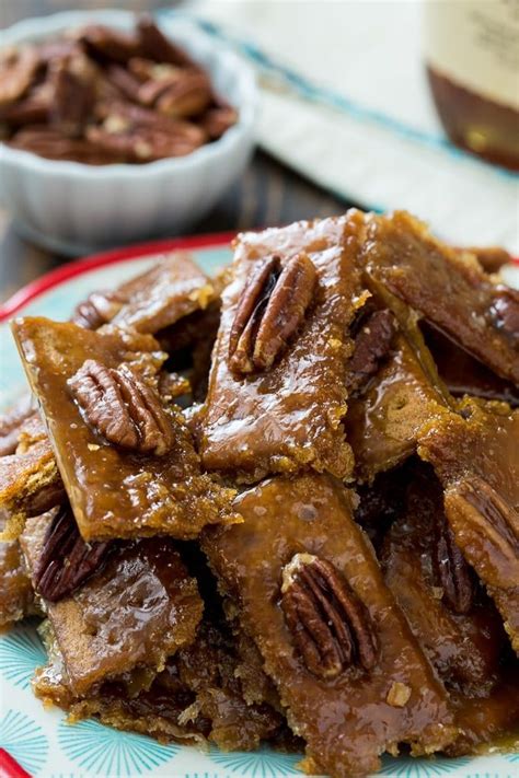 A Plate With Pecan Brittles On Top Of It