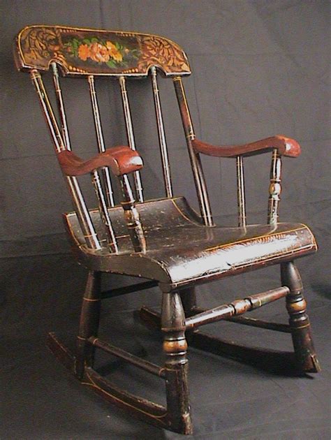 It has a striking black finish, a deep maple wood stain. Antique Child's Rocking Chair Roses & Stenciled 19th C ...