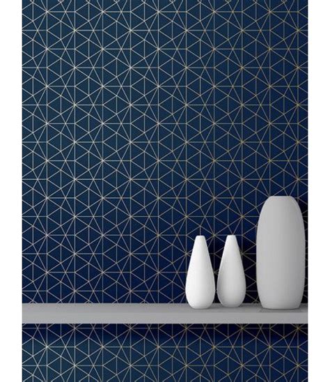 This Metro Prism Geometric Triangle Wallpaper In Navy And Gold Features
