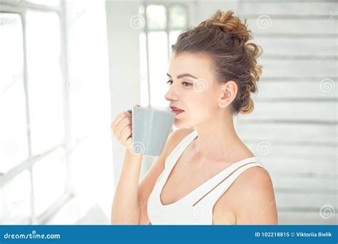 Pretty Young Woman Holding A Cup Of Coffee Stock Image Image Of Face