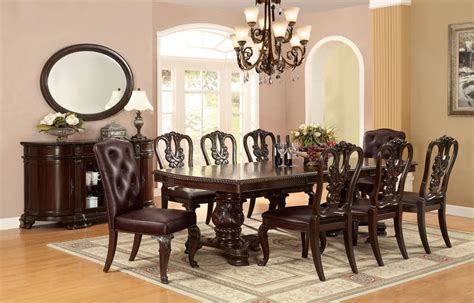 It looks to be a dark oak finish and has two leafs that can be added making it a long oval table with two legs holding it up. Dallas Designer Furniture | Bellagio Formal Dining Room Set