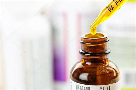 Medicine Dropper And Bottle — Stock Photo © Elenathewise 6696504
