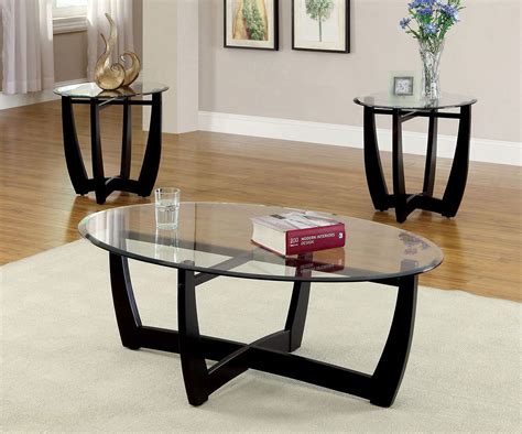 Find a coffee table that echoes the rich tones and elegant style of your current decor, and pair it with a few matching end tables to create a cohesive look. Dafni 3-Piece Occasional Table Set by Furniture of America ...