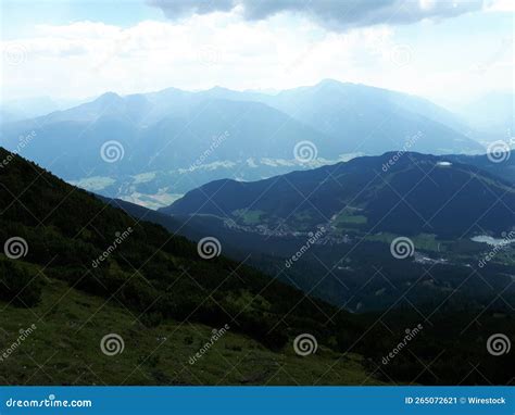 Scenic View Of The Green Mountains And Small Lakes Under Cloudy Sky In