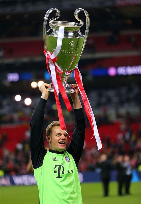 Manuel Neuer Of Bayern Munich With The Uefa Champions League Trophy