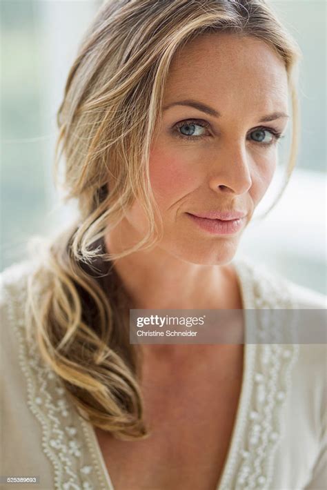 Mature Blonde Woman Looking At Camera Portrait Photo Getty Images