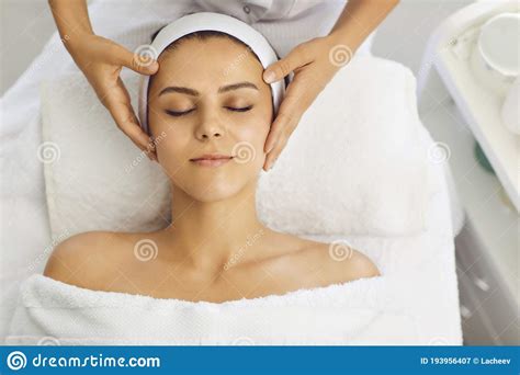 Female Face Massage In A Beauty Salon Beautician Makes Facial Skin Treatment In A Beauty Clinic