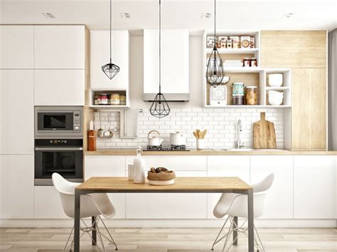 Le plan de travail et la crédence en noyer clair contrastent de l'ensemble et apportent avec les objets déco en osier une touche naturelle et conviviale. Déco cuisine blanche scandinave de rêve