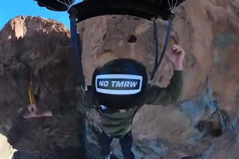 Terrifying Moment Cliff Jumper Clings On To Rock After Parachute Rips