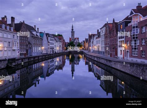 Jan Van Eyckplein Old Town Of Bruges Belgium During Sunset With