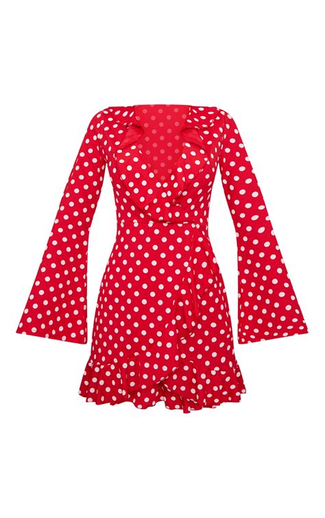 red polka dot frill detail flare sleeve wrap dress prettylittlething