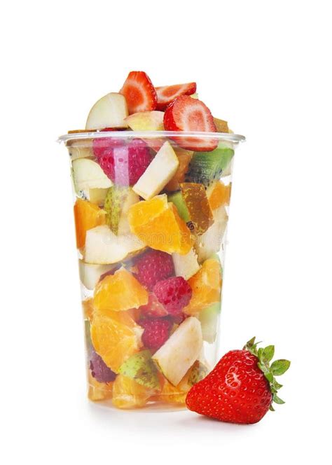 Delicious Fruit Salad In Plastic Cup On White Background Stock Photo
