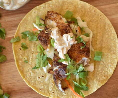 Cook 5 to 10 minutes or until fish flakes easily with fork, rearranging twice. Fish Tacos with Chipotle Crema | Recipe | Chipotle crema ...