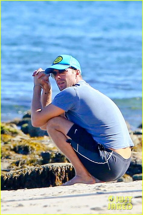 Full Sized Photo Of Chris Martin Smiley Face Beach Photo