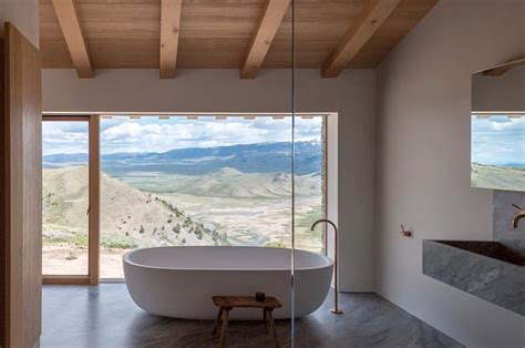 An Instagramted Photo Of A Bathroom With A Large Tub