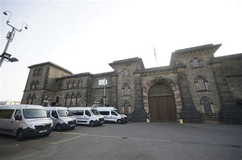 Police comb the UK and put airports on alert for an escaped prison