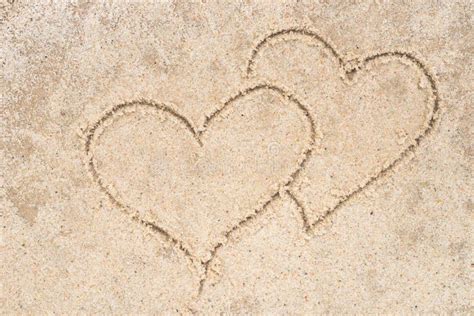 Two Hearts Drawing In Sand Stock Photo Image Of Nature 95735732