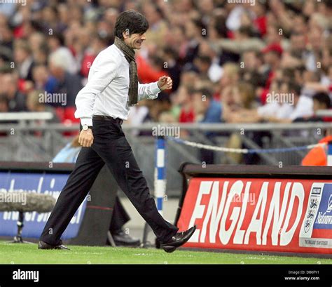 coach of the german national soccer team joachim loew leaves the pitch after the international