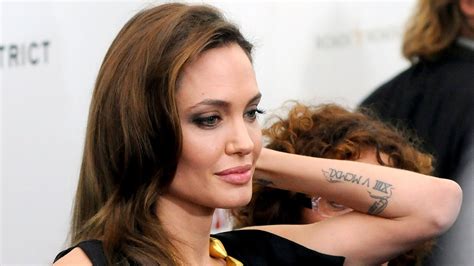 Angelina Jolie Stomach Tattoos