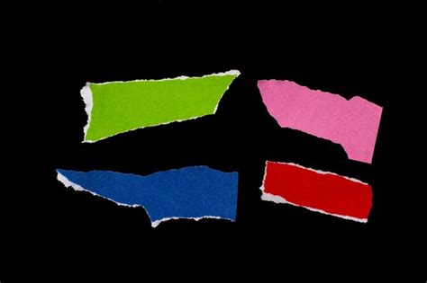 Premium Photo Colorful Torn Paper Pieces Isolated On Black Background