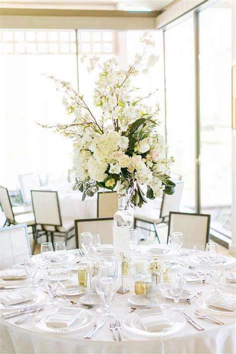 29 Tall Centerpieces That Will Take Your Reception Tables To New