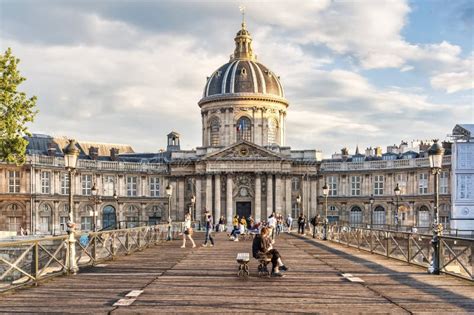 Institut De France And The Pont Des Arts In Paris Editorial Stock