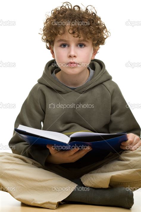 Boy Reading A Book Stock Photo By ©gbh007 32710355