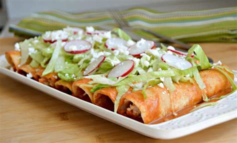 All server with double corn tortilla, cilantro and onions. Red Chicken Enchiladas - Food Market La Chiquita