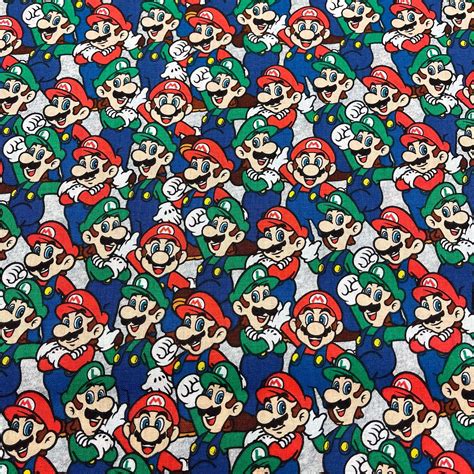 Super Mario 2 100 Cotton Print Fabric Blue 39950 104 By