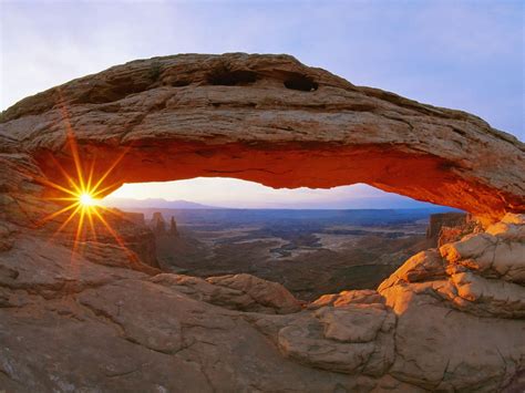 Mesa Arch At Sunset Overlooking Canyonlands National Park Utah