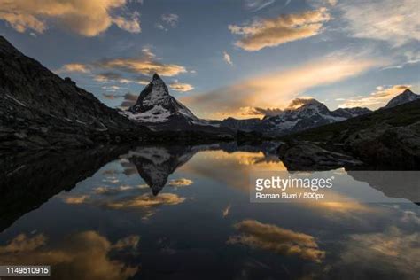 Matterhorn Reflected In Riffelsee Lake At Sunset Photos And Premium