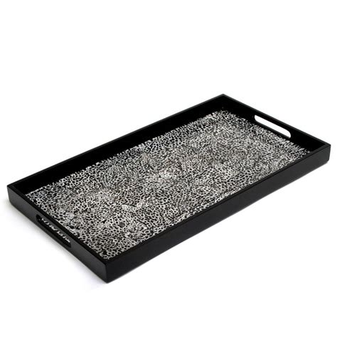 A black guri lacquer rectangular tray, ming dynasty; rectangular lacquer serving tray by nom living ...