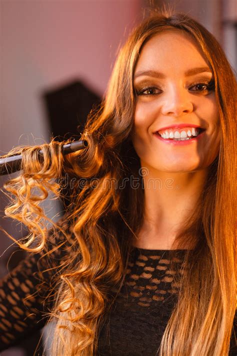 Happy Woman Curling Her Long Brown Hair Stock Image Image Of Enjoying