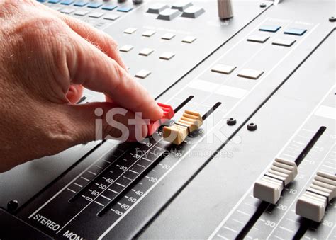 Man Adjusting A Mixing Board Stock Photo Royalty Free Freeimages