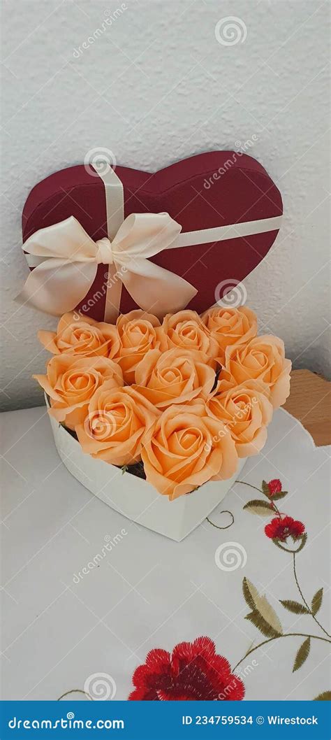 Vertical Shot Of A Heart Shaped Box With Roses Stock Photo Image Of