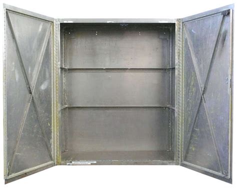 A storage cabinet is a perfect way to keep our rarities visible. Custom-Made Hand-Riveted Aluminum Industrial Storage ...
