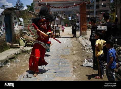 lalitpur nepal 13th aug 2016 a nepalese person dressed in a lakhey costume performs a