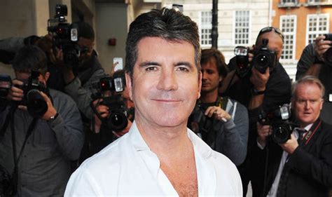 simon cowell says he d never ban one direction from the x factor celebrity news showbiz