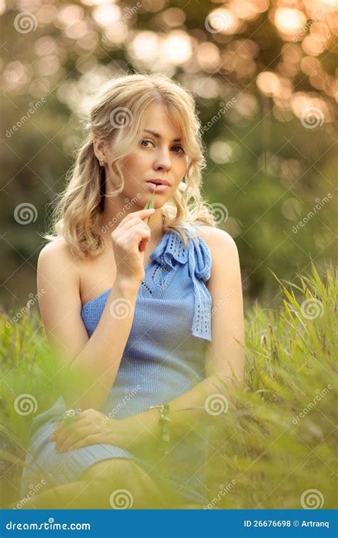 Girl Sitting In The Grass Stock Photo Image Of Beautiful