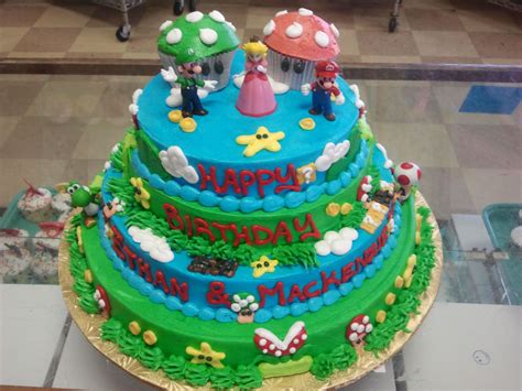 Forget layer cake, level cake is what it's all about for gamers. Mario Brothers collectible figurines with buttercream ...